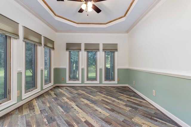 175 Slaughter Dr, Waverly Hall, GA 31831 - spare room with a tray ceiling, ceiling fan, wood finished floors, and crown molding