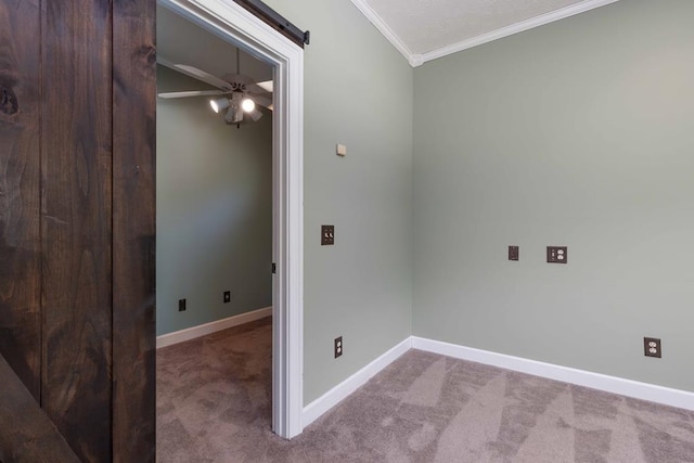 175 Slaughter Dr, Waverly Hall, GA 31831 - unfurnished room with carpet flooring, crown molding, ceiling fan, and a barn door