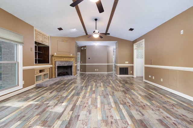 175 Slaughter Dr, Waverly Hall, GA 31831 - unfurnished living room featuring ceiling fan, wood finished floors, and a brick fireplace