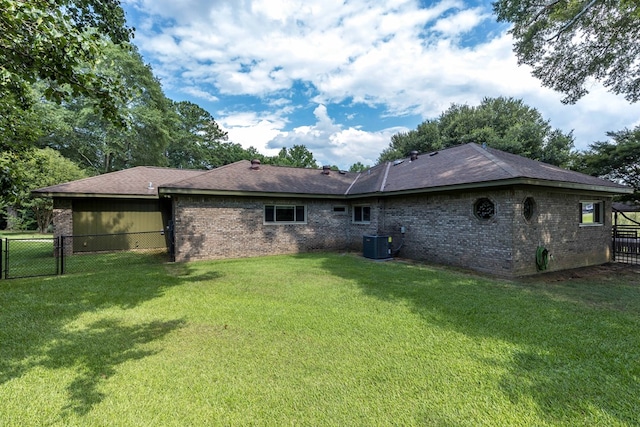175 Slaughter Dr, Waverly Hall, GA 31831 - back of property featuring brick siding, a gate, and a shingled roof