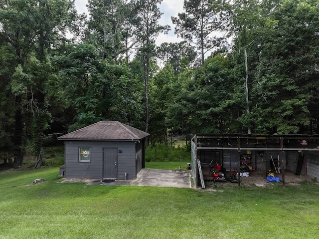 175 Slaughter Dr, Waverly Hall, GA 31831 - view of green lawn featuring an outdoor structure