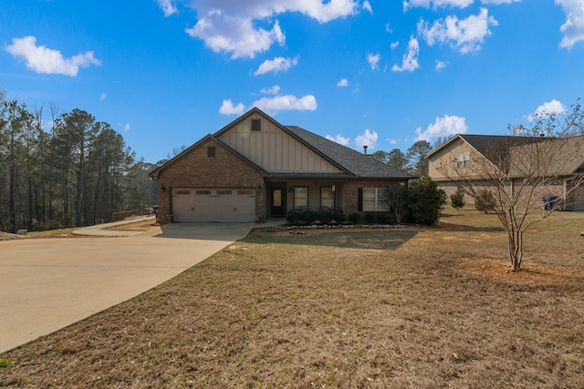 craftsman-style home with brick siding, board and batten siding, concrete driveway, a front yard, and a garage