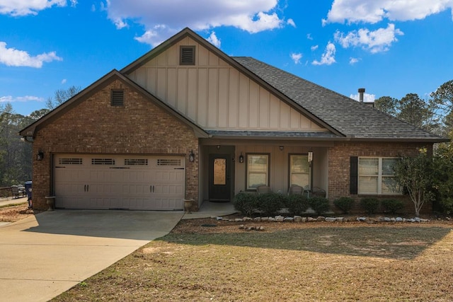 craftsman house featuring roof with shingles, board and batten siding, concrete driveway, a garage, and brick siding