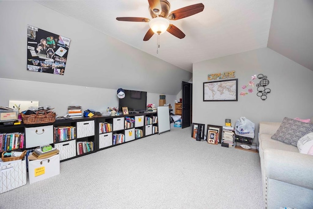 rec room featuring lofted ceiling, carpet flooring, and ceiling fan