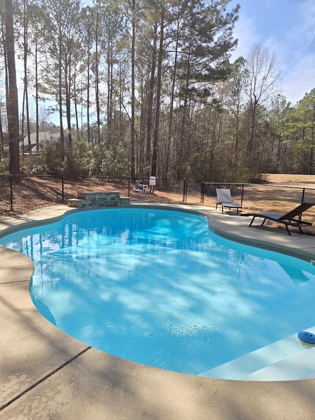 outdoor pool with fence