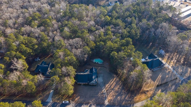 aerial view with a wooded view