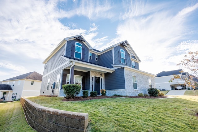 view of front of house featuring a front lawn