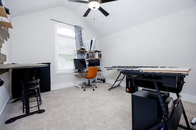 office area with carpet flooring, ceiling fan, and vaulted ceiling