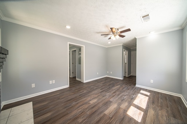 interior space with a textured ceiling, dark hardwood / wood-style flooring, ceiling fan, and crown molding