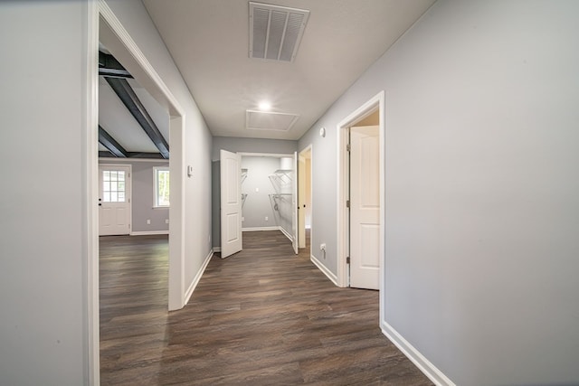 corridor featuring dark wood-type flooring