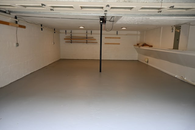 3919 Gray Fox Dr, Columbus, GA 31909 - below grade area featuring a garage, electric panel, and concrete block wall