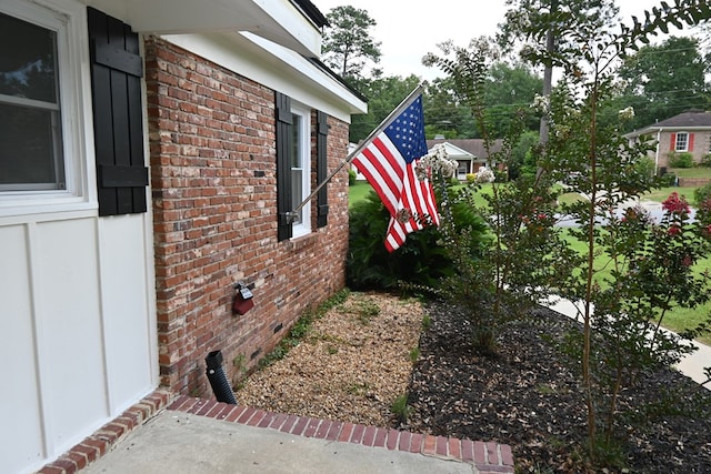 3919 Gray Fox Dr, Columbus, GA 31909 - view of side of property featuring brick siding and board and batten siding