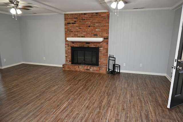 3919 Gray Fox Dr, Columbus, GA 31909 - unfurnished living room with ceiling fan, wood finished floors, a brick fireplace, and crown molding