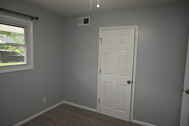 3919 Gray Fox Dr, Columbus, GA 31909 - empty room featuring dark colored carpet and baseboards