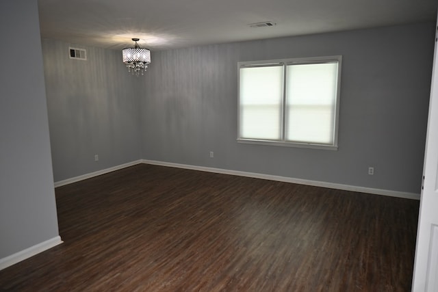 3919 Gray Fox Dr, Columbus, GA 31909 - unfurnished room featuring a chandelier and dark wood finished floors