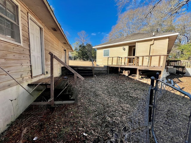 view of yard with a wooden deck