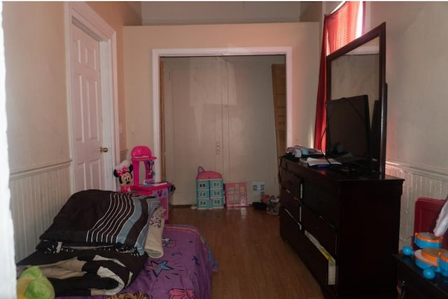 bedroom featuring dark wood-type flooring