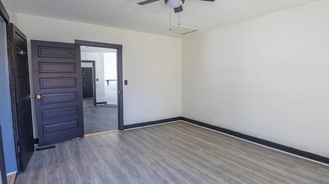 1312 Juniper St, Lagrange, GA 30240 - spare room with wood finished floors, a ceiling fan, and baseboards