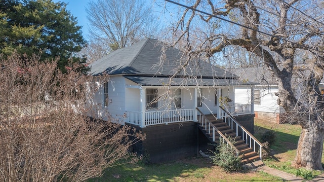1312 Juniper St, Lagrange, GA 30240 - view of front of property with covered porch, stairs, and roof with shingles