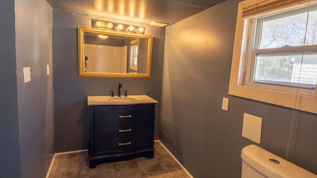 1312 Juniper St, Lagrange, GA 30240 - bathroom with vanity, baseboards, and toilet