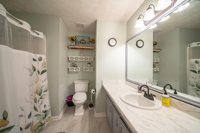 bathroom featuring vanity, a shower with shower curtain, a textured ceiling, and toilet