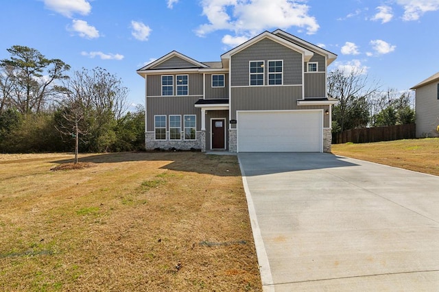 view of front facade featuring a front lawn and a garage