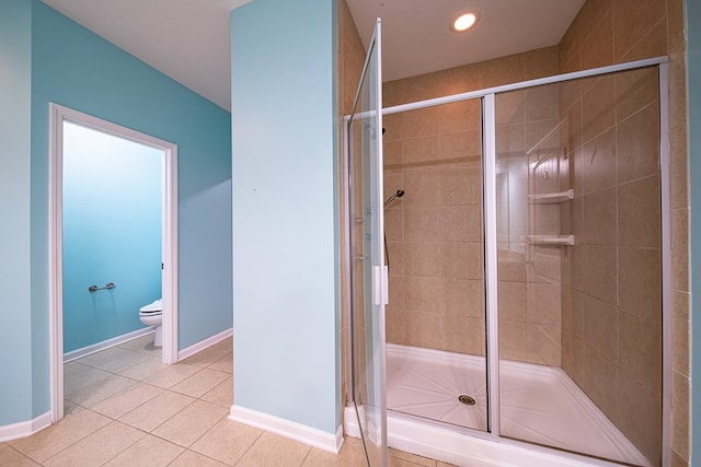 full bathroom with tile patterned flooring, toilet, recessed lighting, baseboards, and a stall shower