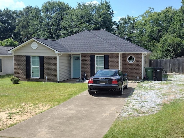 6099 Mary Allison Dr, Columbus, GA 31907 - view of front of home with brick siding, driveway, and roof with shingles