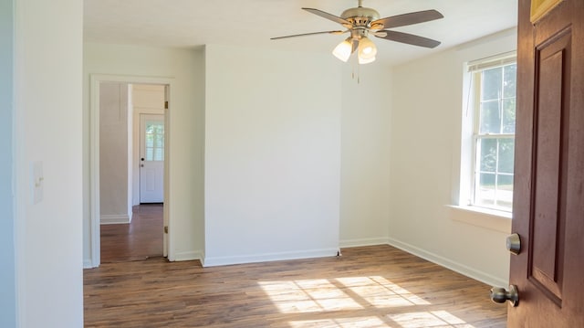 400 Lawrence St, Hogansville, GA 30230 - empty room featuring plenty of natural light, wood finished floors, and ceiling fan