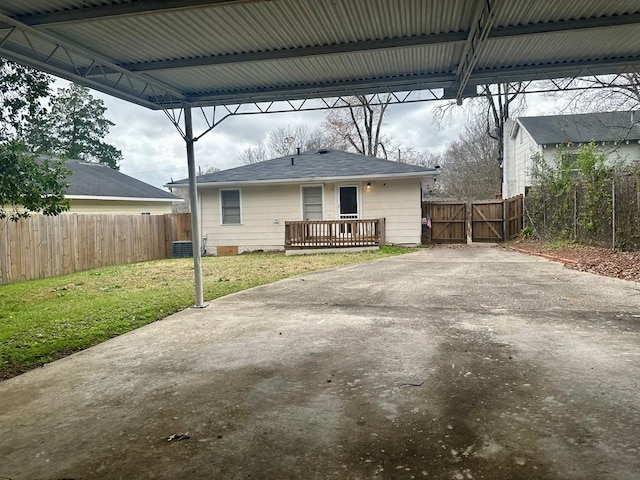 view of front of home featuring crawl space and fence