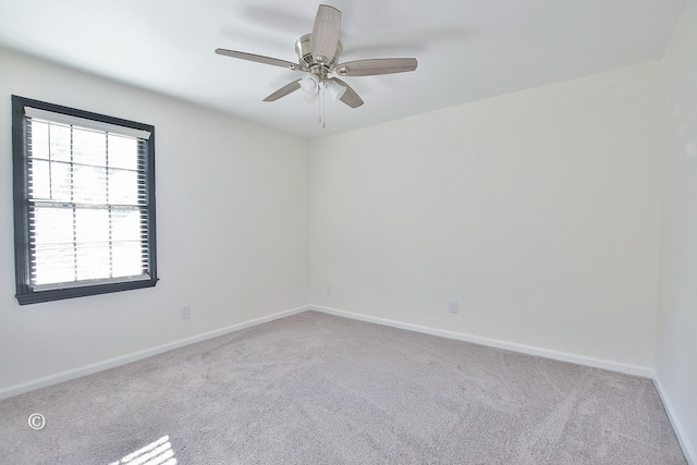 385 Hudson Mill Cir, Hamilton, GA 31811 - unfurnished room featuring carpet floors, plenty of natural light, a ceiling fan, and baseboards