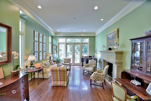 6528 Standing Boy Dr, Columbus, GA 31904 - living room featuring a fireplace, wood finished floors, recessed lighting, and ornamental molding