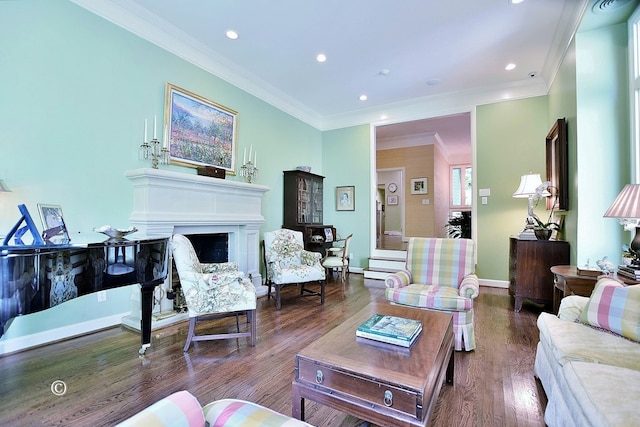 6528 Standing Boy Dr, Columbus, GA 31904 - living room featuring ornamental molding, recessed lighting, wood finished floors, and a fireplace