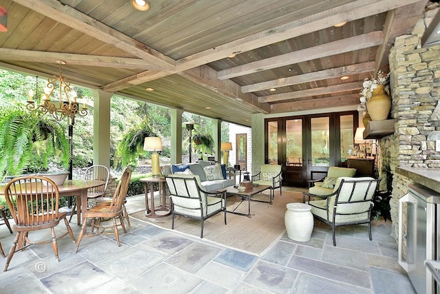 6528 Standing Boy Dr, Columbus, GA 31904 - sunroom featuring beamed ceiling, an inviting chandelier, french doors, and beverage cooler