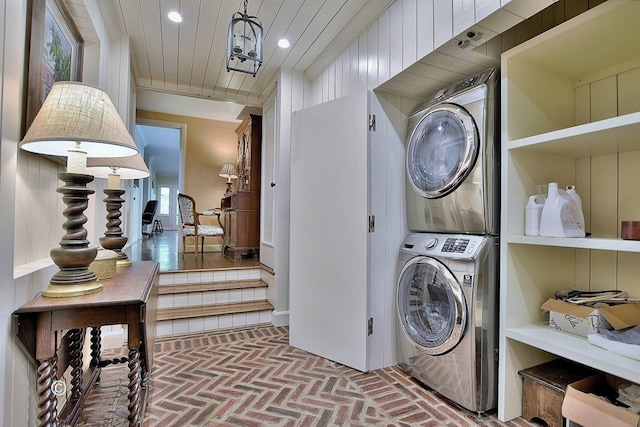 6528 Standing Boy Dr, Columbus, GA 31904 - laundry room featuring recessed lighting, stacked washer and clothes dryer, laundry area, and brick floor