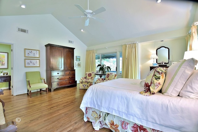 6528 Standing Boy Dr, Columbus, GA 31904 - bedroom with light wood-style flooring, visible vents, recessed lighting, and high vaulted ceiling