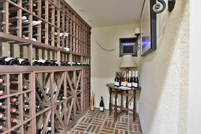 6528 Standing Boy Dr, Columbus, GA 31904 - wine cellar with a wall unit AC, brick floor, and baseboards