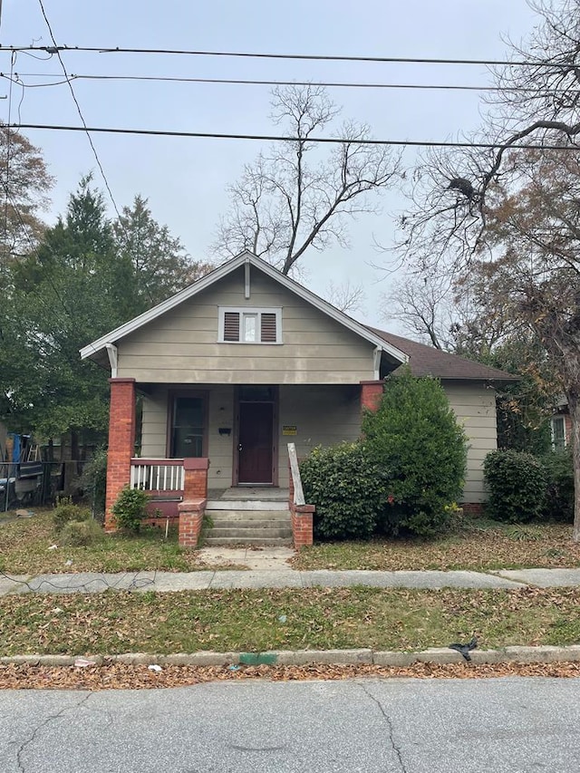 bungalow-style home with a porch