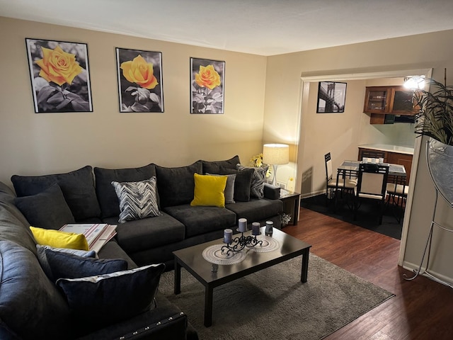 living room with dark wood-type flooring