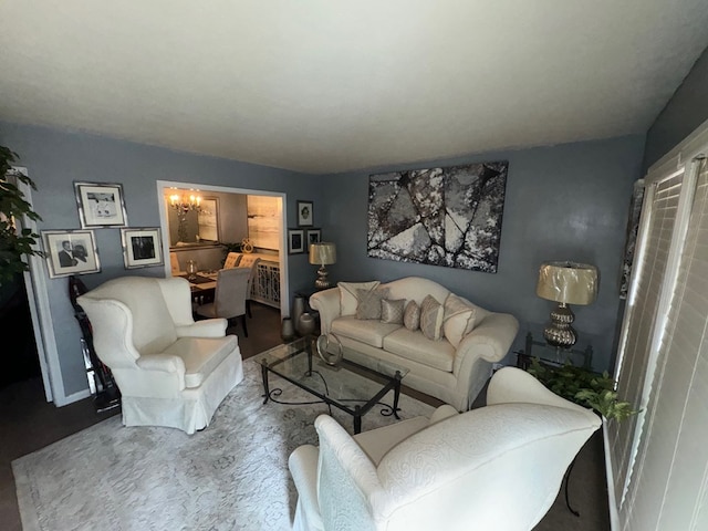 living room with an inviting chandelier