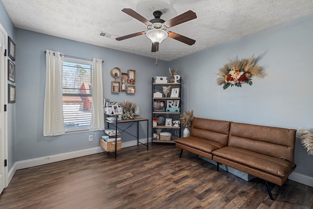10 Cedarwood Ln, Phenix City, AL 36870 - sitting room with wood finished floors, baseboards, a textured ceiling, and a ceiling fan