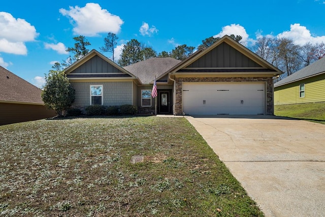 10 Cedarwood Ln, Phenix City, AL 36870 - view of front facade with board and batten siding, an attached garage, concrete driveway, and a front yard