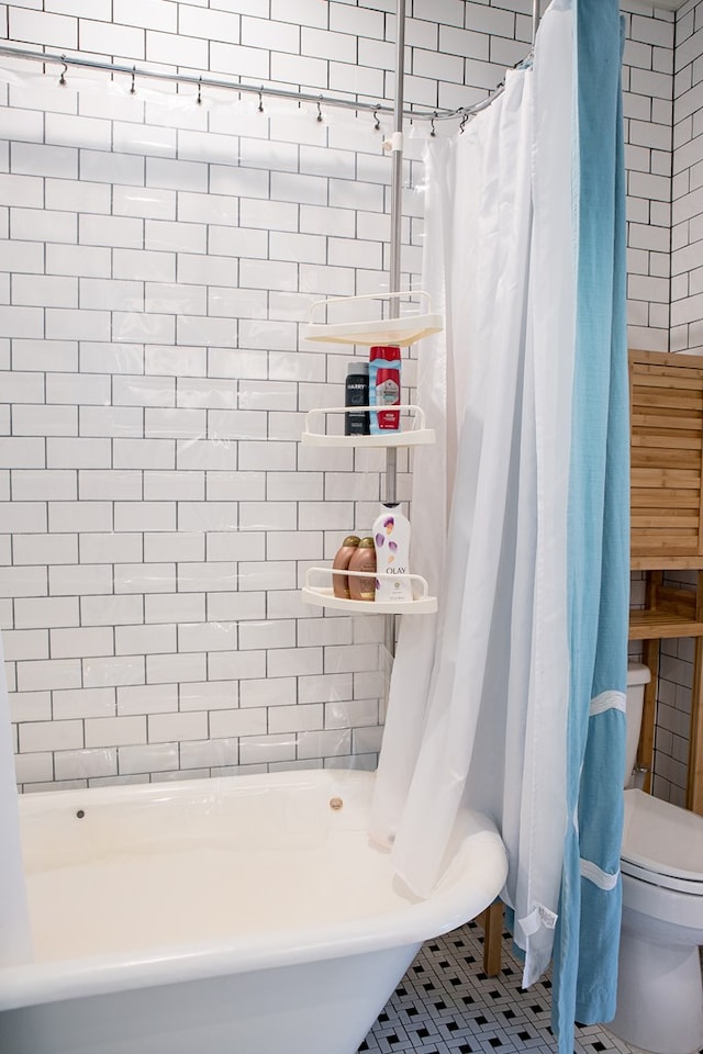 617 3rd Ave, Columbus, GA 31901 - bathroom with toilet and shower / bath combo with shower curtain
