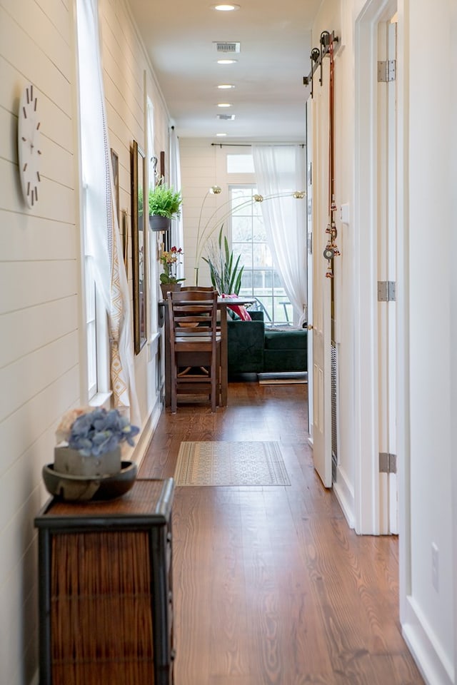 617 3rd Ave, Columbus, GA 31901 - corridor with a barn door and wood finished floors