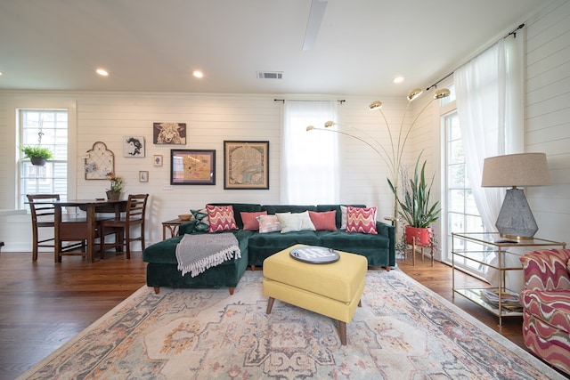 617 3rd Ave, Columbus, GA 31901 - living room featuring wood finished floors, wooden walls, and recessed lighting