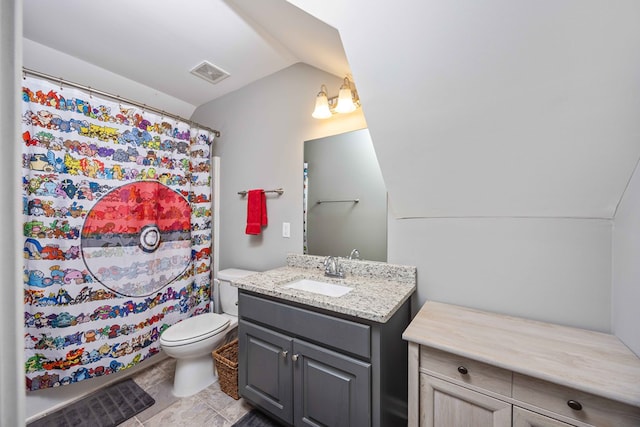 bathroom with vaulted ceiling, vanity, toilet, and a shower with shower curtain