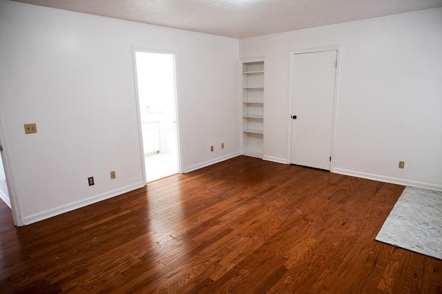 interior space featuring dark wood-type flooring