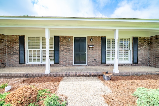 2310 Nottingham Dr, Columbus, GA 31904 - entrance to property featuring a porch and brick siding