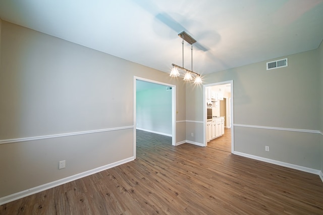 2310 Nottingham Dr, Columbus, GA 31904 - empty room with wood finished floors and baseboards
