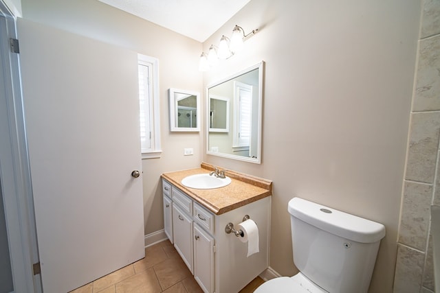2310 Nottingham Dr, Columbus, GA 31904 - half bathroom with vanity, toilet, and tile patterned floors